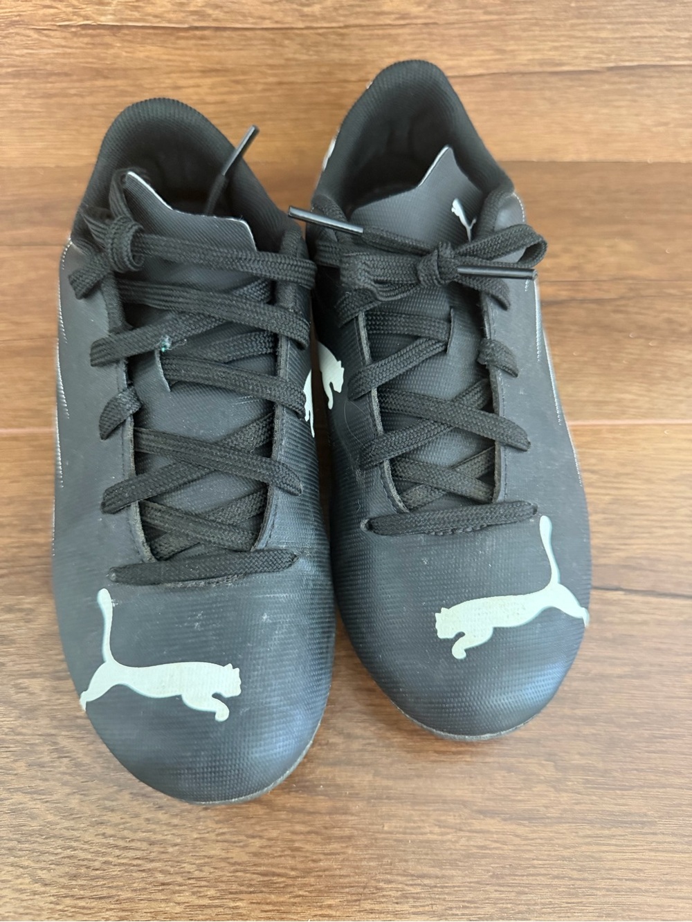 Puma kids Black Athletic Shoes with White Puma Logo